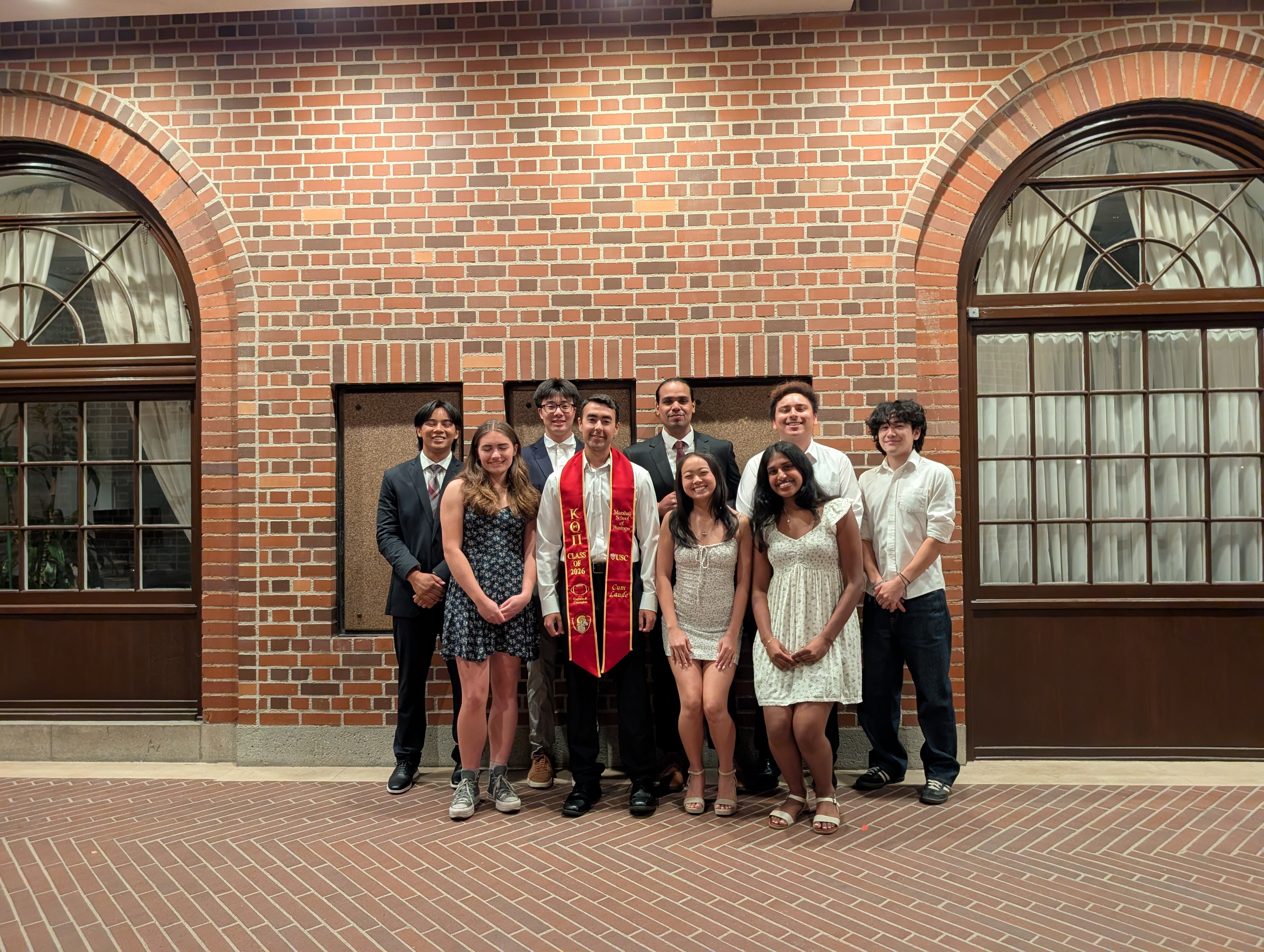 Mikhael Hilaly with teammates at USC graduation